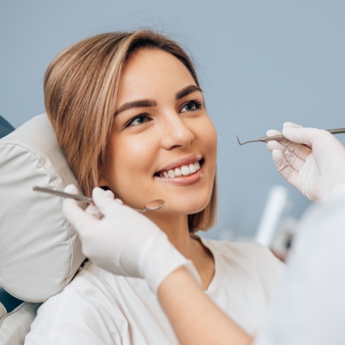 Woman smiling during dental checkup